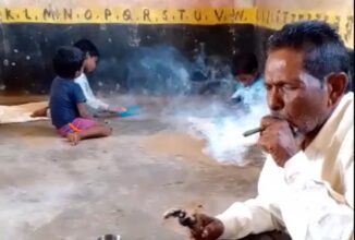 Drunk Teacher: Pradhan Pathak was smoking ganja in front of the students in the school…see VIDEO and order