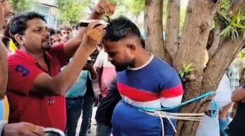 Youth Beaten: Two youths tied to a tree, beaten and then hair cut…VIDEO