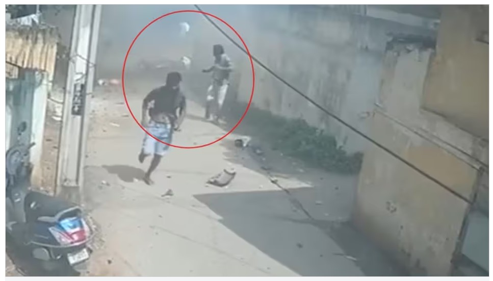 Explosion in Firecrackers: Big explosion while carrying firecrackers on a scooter...! The scooter driver was blown to pieces...body parts scattered on the roads...people with weak hearts should not watch this video