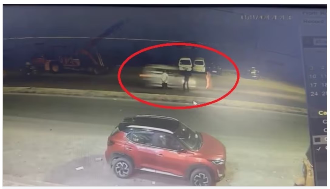 Crossing the Road: A woman was hit by a speeding car... she was thrown in the air and got stuck in the car... the driver dragged her for 100 feet in the same condition... she died on the spot... watch the painful scene here VIDEO