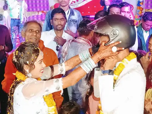 Road Accident: Performed the ritual of road safety by wearing a helmet along with a ring during engagement.